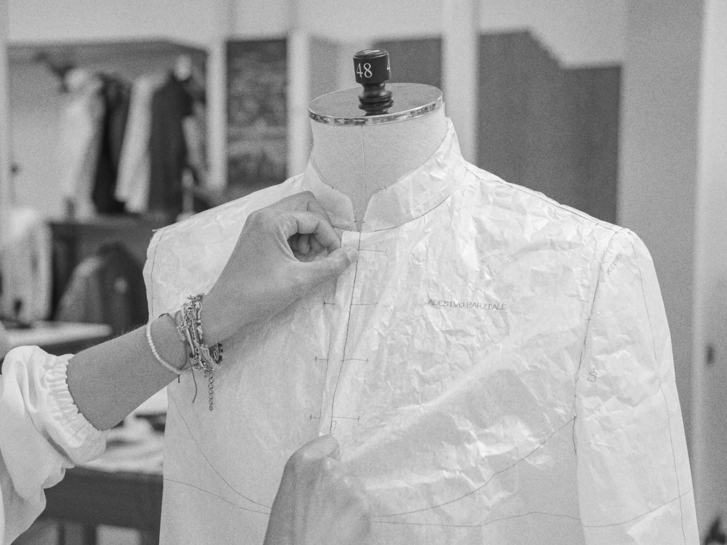 Pinning a paper toile on the stand